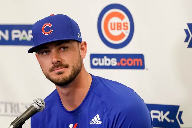 Chicago Cubs third baseman Kris Bryant speaks to reporters on Saturday in Mesa, Ariz.