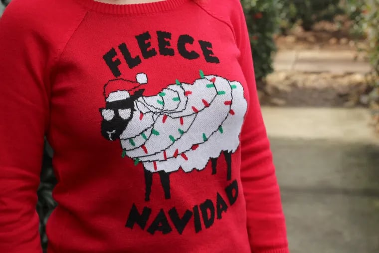 Ugly sweaters are the dress code for an otherwise swanky Art Museum cocktail party . (Photo By Jamie for Red Lol Vintage Fleece Navidad Christmas Sheep Sweater)