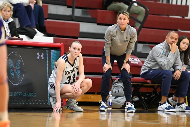 West Chester Rustin senior Riley Stackhouse (left) waits to check in as her mother Lauren coaches next to her on Jan. 14 at Arcadia.