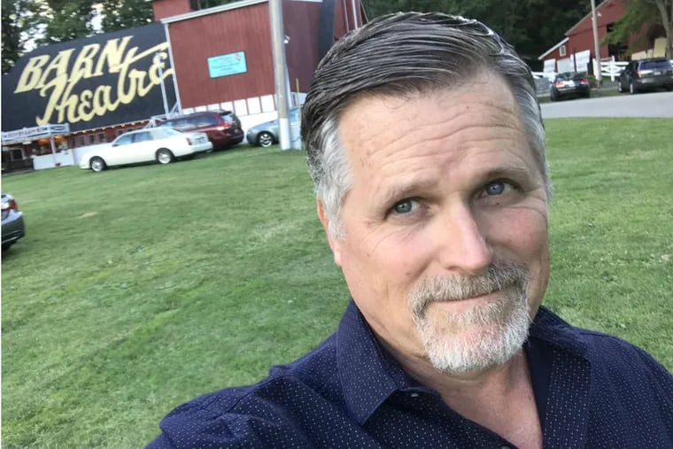 Robert Newman takes a selfie outside the Barn Theatre in Augusta, Mich., a place, he says, "I really consider my home as a professional actor."