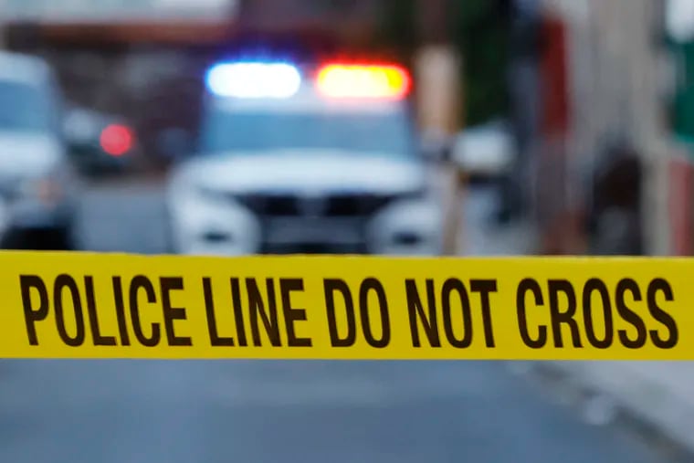 Police tape is placed near the 1400 block of W. Pacific Street in North Philadelphia, where a 10-year-old boy died of a self-inflicted gunshot wound Saturday after discovering a loaded firearm in the house.