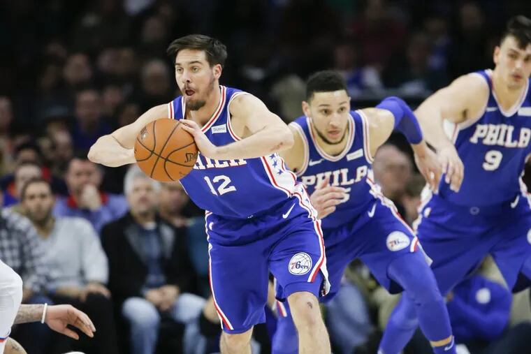 Sixers guard T.J. McConnell passes the basketball on a fast break against the New York Knicks on Monday, Feb. 12.