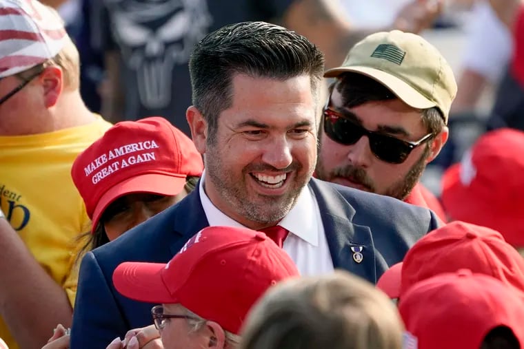 Sean Parnell during a campaign rally for then-President Donald Trump at the Pittsburgh International Airport in Moon Township on Sept. 22, 2020. Parnell, then a congressional candidate, is now considering a run for U.S. Senate.