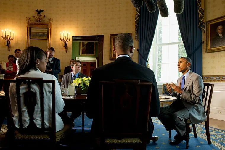 President Barack Obama speaks with teachers about education in the Blue Room of the White House in Washington. From left around the table are Justin Minkel, of Arkansas, facing camera, President Obama, Dwight Davis of Greensboro, N.C., and LeShawna Coleman of Philadelphia. (AP Photo/Jacquelyn Martin)