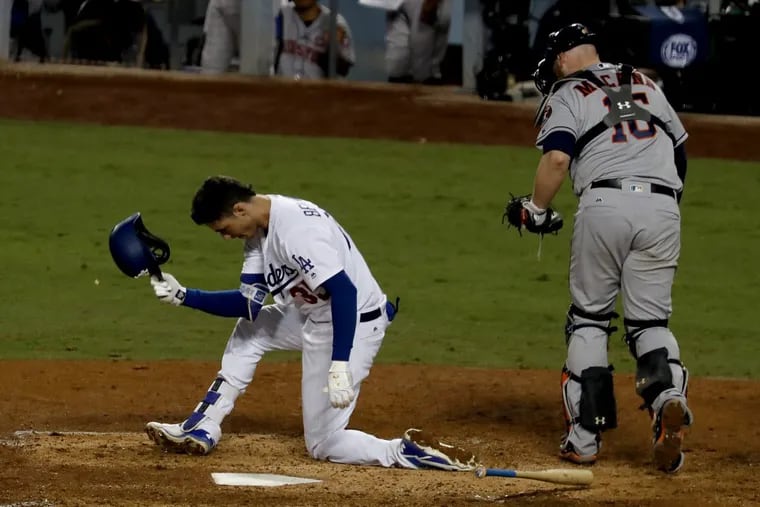 The Dodgers' Cody Bellinger reacts after striking out with men on base against the Houston Astros in the eighth inning during Game 6 on Tuesday.
