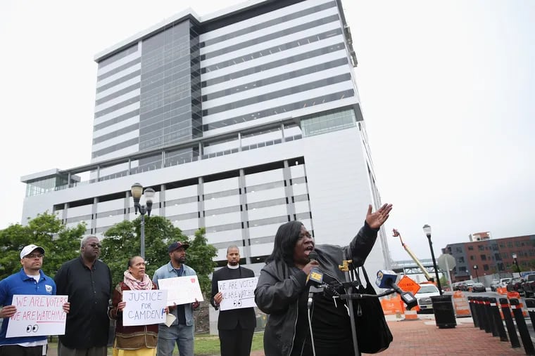 Community activist and Camden City Council candidate Vida Neil Rosiji, right, speaks during a news conference advocating for tax-incentivized development to benefit longtime residents in Camden, N.J., on Thursday, May 9, 2019. The new high-rise office tower on Camden's waterfront involved $245 million in tax breaks, but activists and residents said the project would not benefit the community.