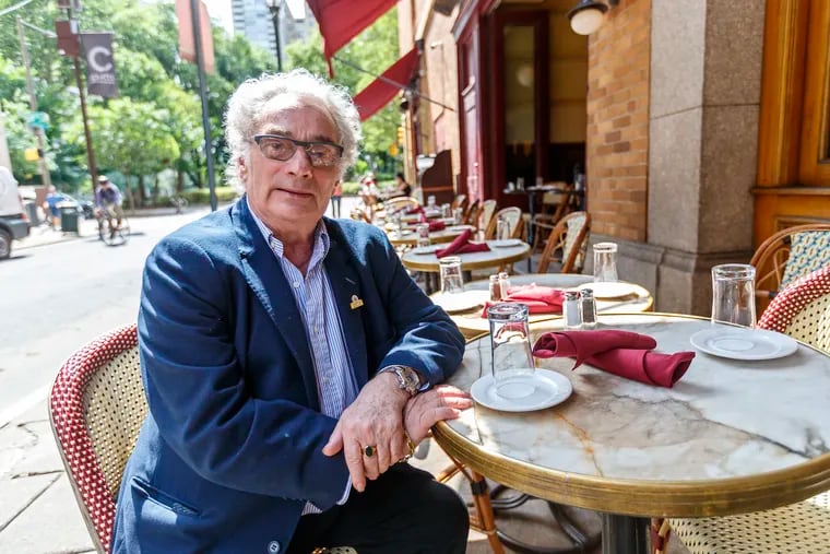 Chef Georges Perrier, in his element amid the Rittenhouse Square parade at Parc restaurant. 