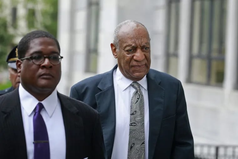Bill Cosby enters the Montgomery County Courthouse with his spokesman Andrew Wyatt for the sixth day of deliberation Saturday June 17th, 2017. ( DAVID SWANSON / Staff Photographer )
