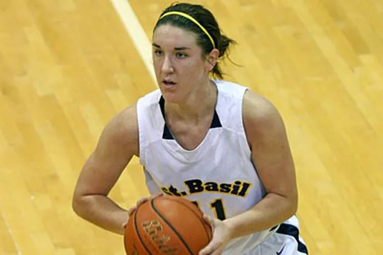 St. Basil senior guard Erin Fenningham is back on the court after three surgeries to repair torn knee ligaments. (Lou Rabito/Staff)