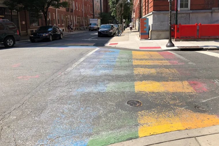 The crosswalks at 13th and Locust streets in the Gayborhood have faded considerably since they were installed in 2015.