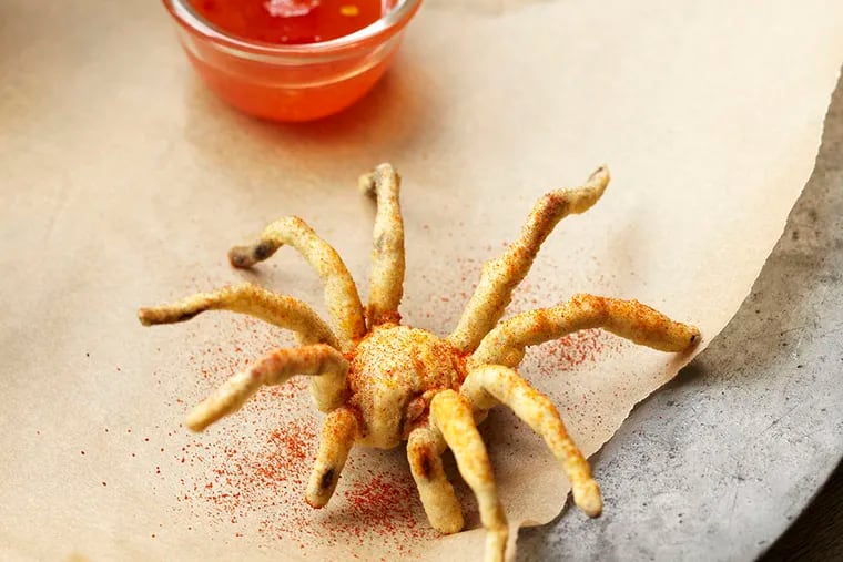 The Eat-a-Bug Cookbook by David George Gordon includes a recipe for battered and fried tarantula. ( Photo by Chugrad McAndrews )