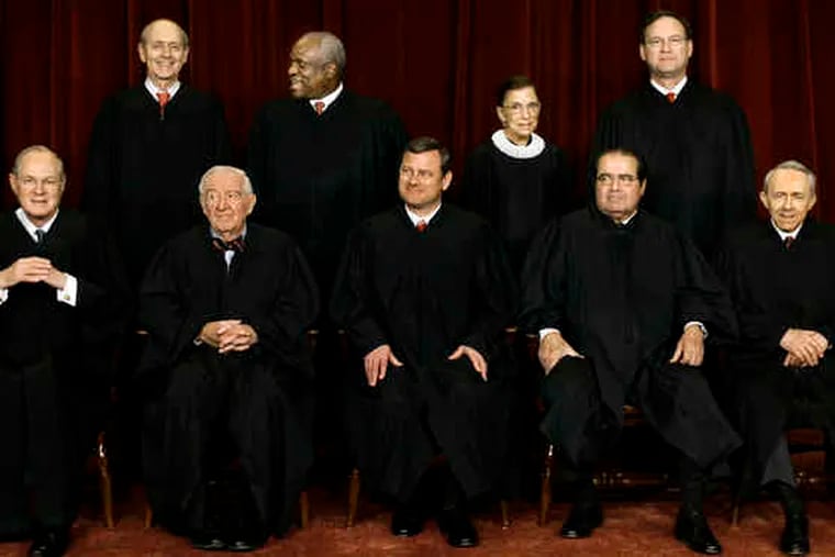 The high court as constituted until the retirement of Justice David H. Souter (front, right). A new member &quot;changes the whole family,&quot; said Justice Clarence Thomas (rear, second from left).