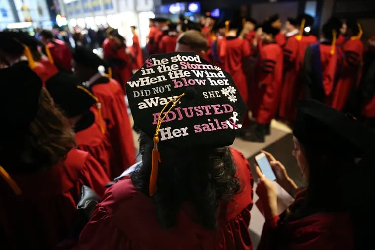Rutgers-Camden Law School graduate Deirdre Laws, of Sicklerville, N.J., decorated her cap to honor her mother who died of cancer.