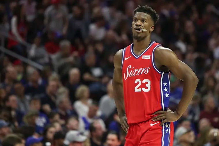 Sixers forward Jimmy Butler walks down the court during free-throw attempts by the Sacramento Kings in the second quarter of a game at the Wells Fargo Center on March 15.