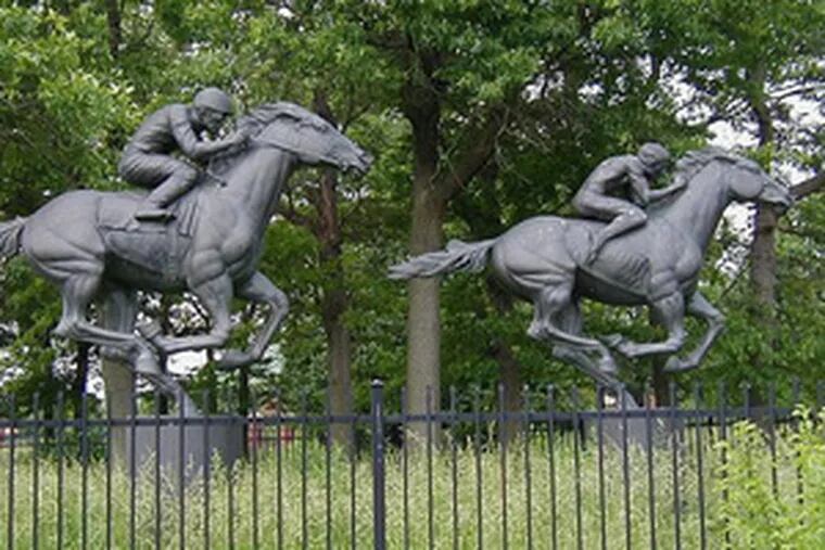 Has anyone seen this horse? The 12-foot bronze statue on the right was stolen from the site of the old Garden State Park.