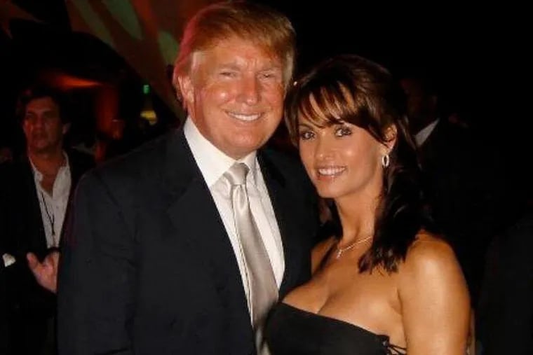 Donald Trump with former Playboy model Karen McDougal in a photo she shared on Twitter in 2015.
