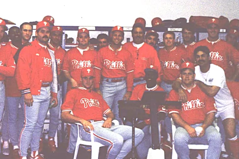 The 1995 Phillies replacement team is joined by manager Jim Fregosi (right of center). Among others are Pete Conlin (behind player seated on left), Joe Cipolloni (head visible to Conlin's left), Todd Cruz (white shirt) and Dan Barbara (seated on right).