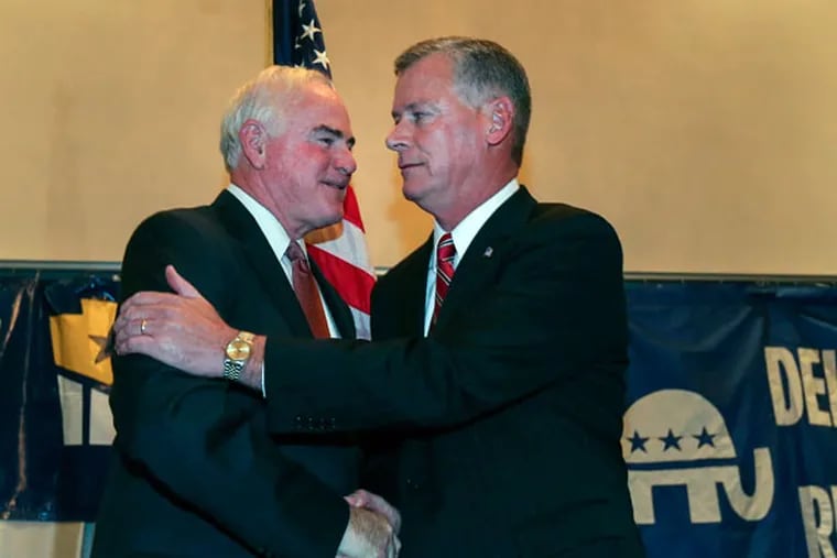 Pat Meehan (left) with Tom McGarrigle at the Springfield Country Club in Delaware County, Tuesday, November 4, 2014. The Delaware County Republican easily beat Democrat Mary Ellen Balchunis. ( Steven M. Falk / Staff Photographer )