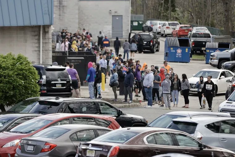 Customers waited in long lines to buy marijuana at Cannabist in Deptford, N.J. on April 21, the first day recreational sales became legal. But lawyers warn against driving after using the drug.