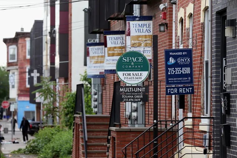 Property management signs advertise student housing for rent on Willington Street near West Oxford Street, a neighborhood adjacent to Temple University in North Philadelphia.