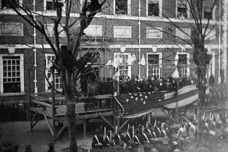 President-elect Abraham Lincoln reviews troops at Independence Hall; the photograph was taken Feb. 22, 1861. Lincoln stopped in Philadelphia on his trip by train to Washington for his inaguration. President-elect Barack Obama will partially re-create that trip, starting here next Saturday.