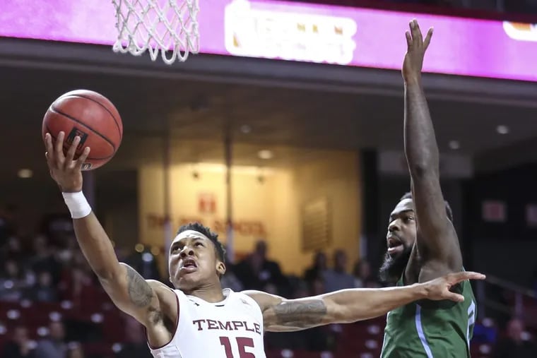 Temple's Nate Pierre-Louis shooting in front of Tulane's Jordan Cornish last Thursday.