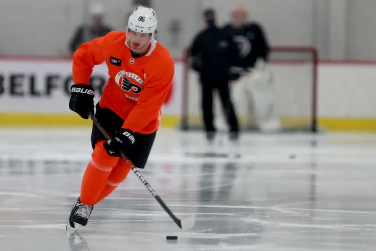 Winger Joel Farabee warming up during a Flyers camp session Monday. They did not practice Thursday and are back on the ice Friday morning.