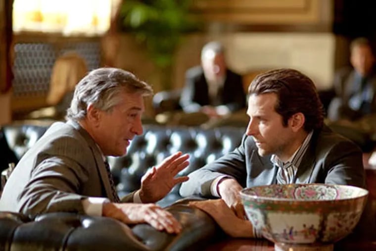 Cooper with Robert De Niro in "Limitless."