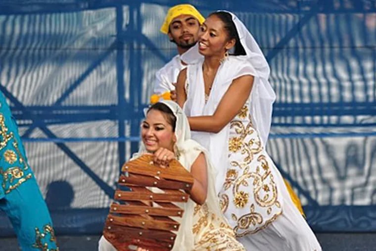 Kammini Rajoopath, (center, standing), was a sophomore at Temple University and co-captain of the school's Bhangra dance team. Bhangra is a form of traditional Indian dance. (Family photo)