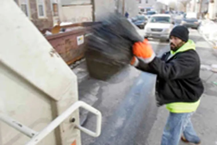 Philadelphia sanitation worker. (ELIZABETH ROBERTSON / Staff Photographer)