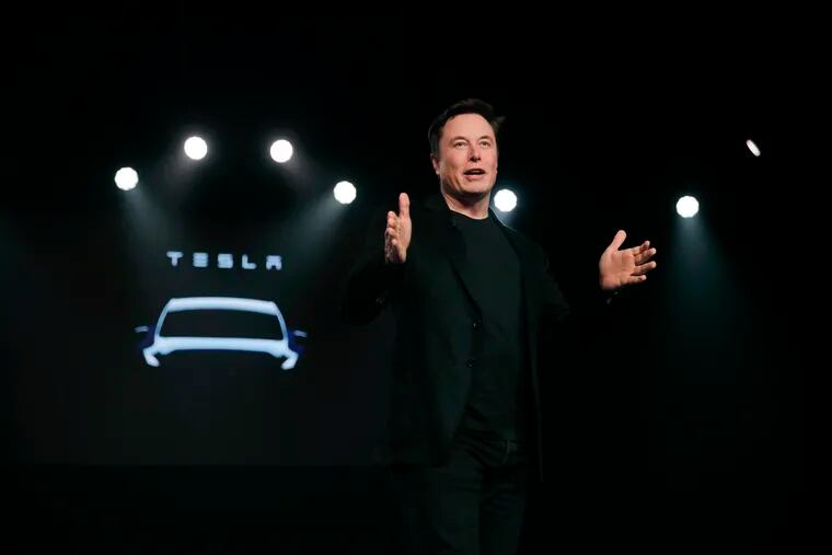 FILE- In this March 14, 2019, file photo Tesla CEO Elon Musk speaks before unveiling the Model Y at Tesla's design studio in Hawthorne, Calif.
