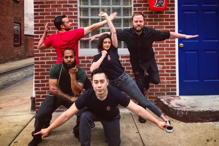 Jesse Ito (foreground) and staff re-create the Ginyu Force Pose, also known as the Tokusentai, from Dragon Ball outside royal Izakaya.