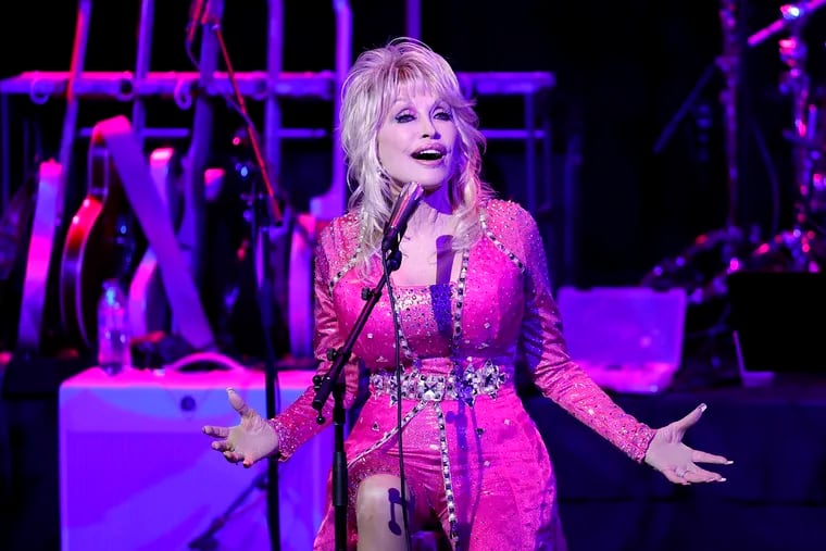 Dolly Parton performing at the 2021 Kiss Breast Cancer Goodbye Concert at CMA Theater at the Country Music Hall of Fame and Museum on Oct. 24 in Nashville, Tenn.