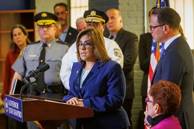 Philadelphia City Councilmember Quetcy Lozada speaks next to Pennsylvania Governor Josh Shapiro (right) during a news conference last month. On Thursday, she introduced legislation that would effectively ban supervised-injection sites in about half the city.