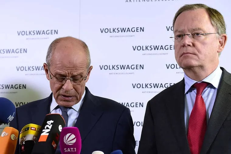 Members of Volkswagen's supervisory board talk to reporters in Wolfsburg, Germany, about Martin Winterkorn's resignation as CEO. Winterkorn denied any wrongdoing but said the scope of the problem demanded that he resign.