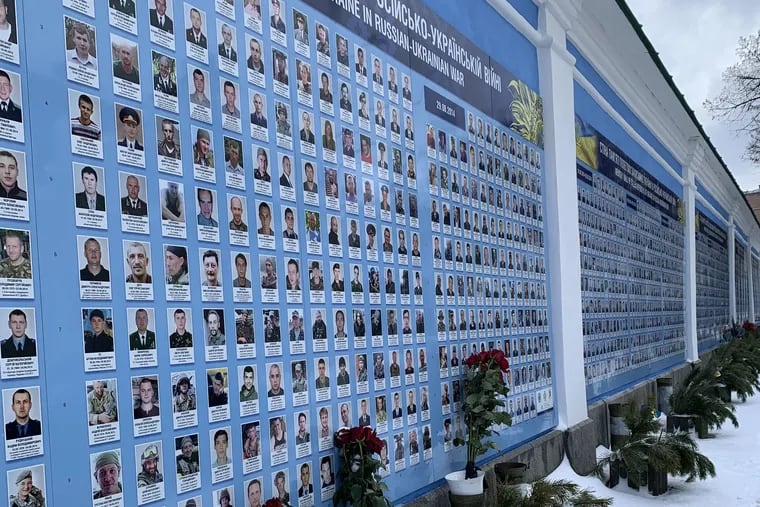 The Memory Wall of the Fallen Defenders in Kyiv depicts photos of the 15,000 Ukrainian men and women soldiers killed by Russian and pro-Russian forces in eastern Ukraine since 2014.