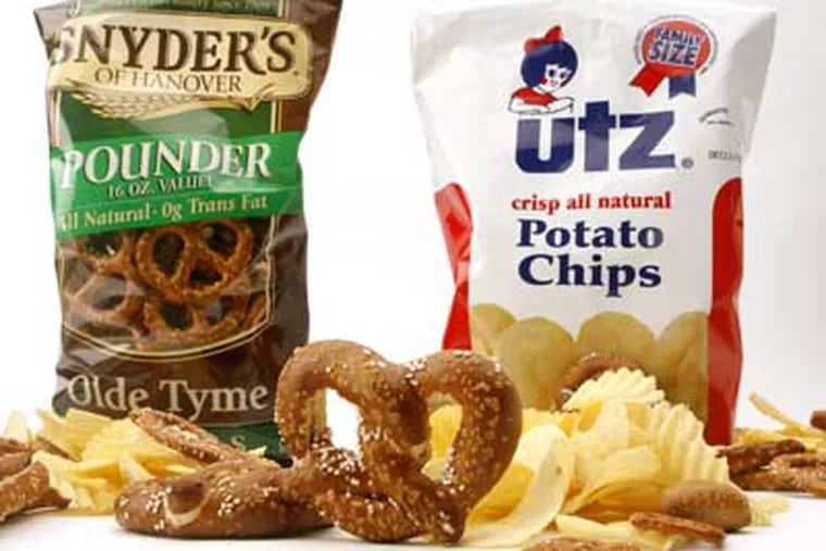 After the companies merge, Snyder's of Hanover and Utz Quality Foods will have less reason to continue their decades-long York County, Pa., rivalry. (Charles Fox / Staff Photographer)