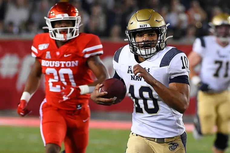 Navy quarterback Malcolm Perry (10), shown running the ball against Houston on Nov. 30, has been a spark this season for the Midshipmen, who will try to break a three-game losing streak Saturday against Army.
