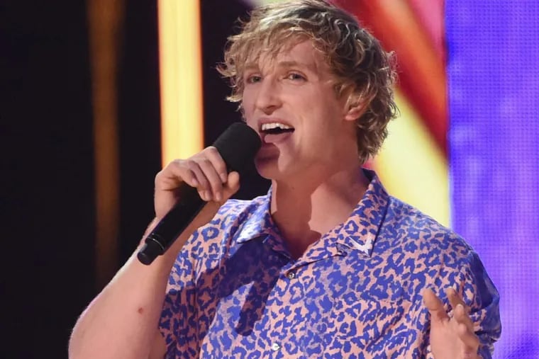 In this Aug. 13, 2017, file photo, Logan Paul introduces a performance by Kyle &amp; Lil Yachty and Rita Ora at the Teen Choice Awards at the Galen Center in Los Angeles