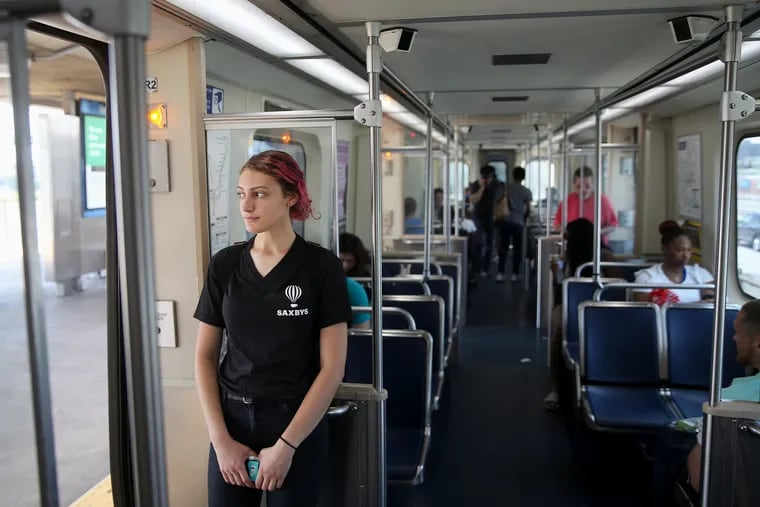 Kristen Adamczyk rides the Market-Frankford line to her job in Center City on Wednesday, June 20, 2018. Adamczyk, 20, does not have a driver's license and uses public transit to get to work.