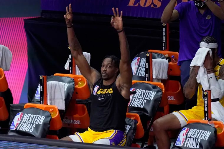 Dwight Howard celebrates late in a Western Conference finals game between his Lakers and the Nuggets in September.