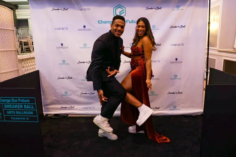 (L-R) Co-founders of Change Our Future, Rodney McLeod and Erika McLeod pose for a photo at the 2021 Change Our Future Art & Sole: Sneaker Ball Toy Drive event at the Arts Ballroom in Philadelphia, Pennsylvania, U.S., December 6, 2021.