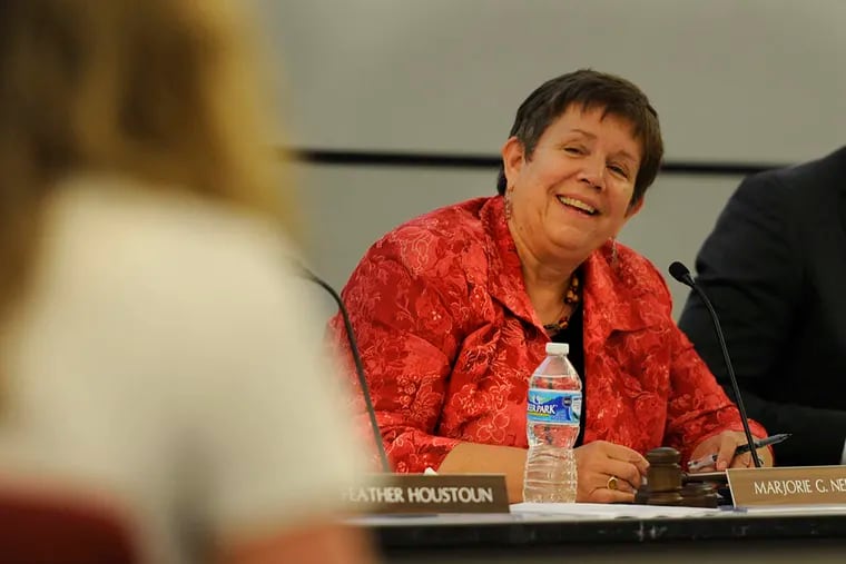 Marge Neff, the new chair of the School Reform Commission and former principal of Masterman, chairs the SRC meeting on May 11,  2015. ( TOM GRALISH / Staff Photographer )