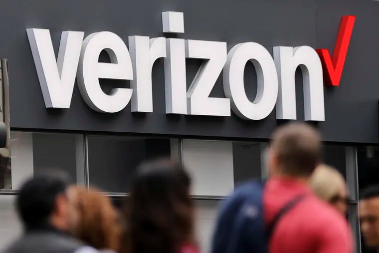 People walk by a Verizon store in New York. Pennsylvania Attorney General Josh Shapiro sued the company on Monday over misleading marketing.