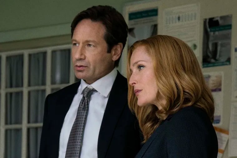 Gillian Anderson with David Duchovny in &quot;The X-Files.&quot;