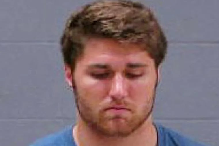 Philip Nelson, 20, appears in this May 11, 2014 booking photo provided by Blue Earth County Jail. The former Minnesota Gophers quarterback was arrested in Mankato, Minn., early Sunday, May 11, 2014, on suspicion of third-degree assault. Former Minnesota State, Mankato, linebacker Isaac Dallas Kolstad was in critical condition Monday after an alleged assault involving Nelson. (AP Photo/Blue Earth County Jail)