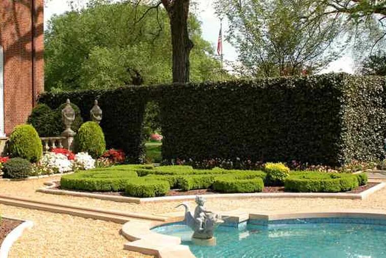 The French parterre at Hillwood Museum and Gardens in Washington includes a pool as the central focal point. The word &quot;parterre,&quot; of European origin, refers to formal gardens with edged beds, often divided by walks, designed to form a pattern.