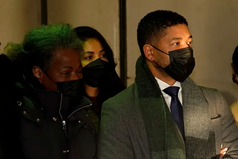 Actor Jussie Smollett, right, departs the Leighton Criminal Courthouse on Wednesday with his mother, Janet.