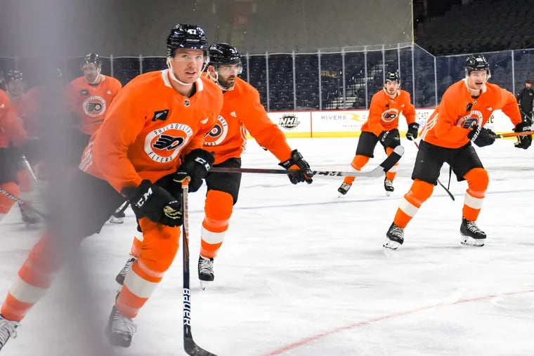 Ronnie Attard (47) sprints around the rink during the Flyers morning skate ahead of their home game against the Columbus Blue Jackets on Tuesday, April 5, 2022.