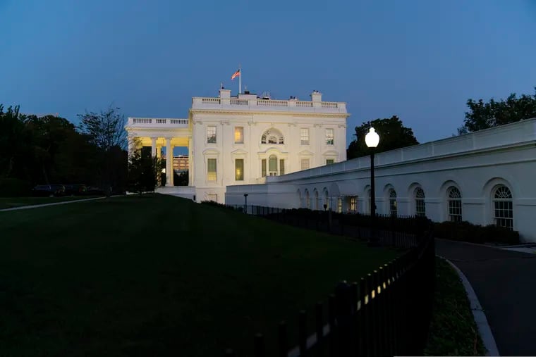 The White House illuminated at sunset on Tuesday.